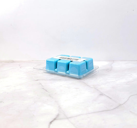 Handcrafted island-inspired wax melt with pineapple, papaya, and berries