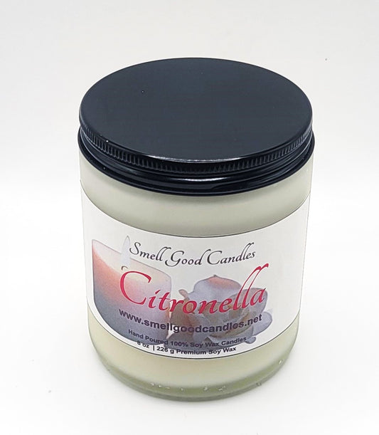 Natural bug-repellent candle with floral and citrus fragrance