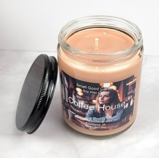 Hand-poured soy candle in an 8oz jar with a cozy café-inspired fragrance