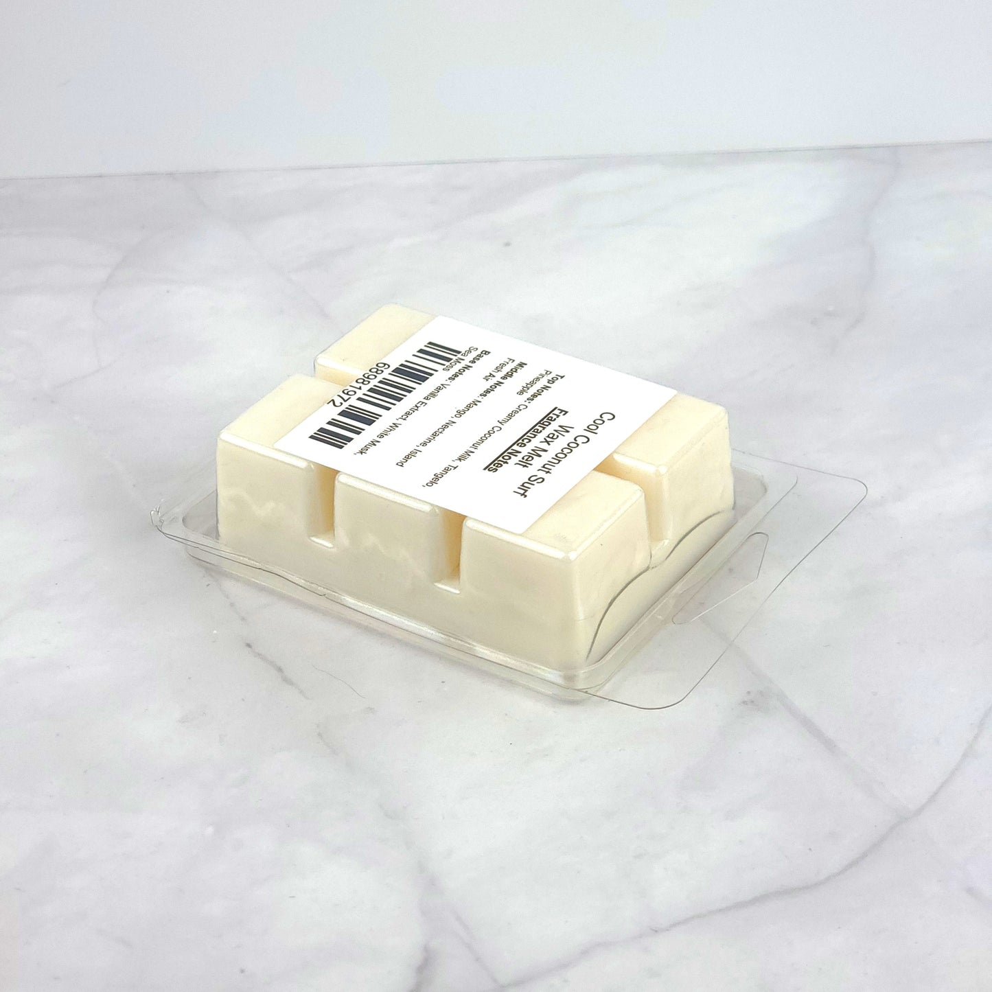 Soy wax melt with a blend of creamy coconut, fresh mango, and oceanic notes of sea moss and white musk, perfect for a coastal escape.