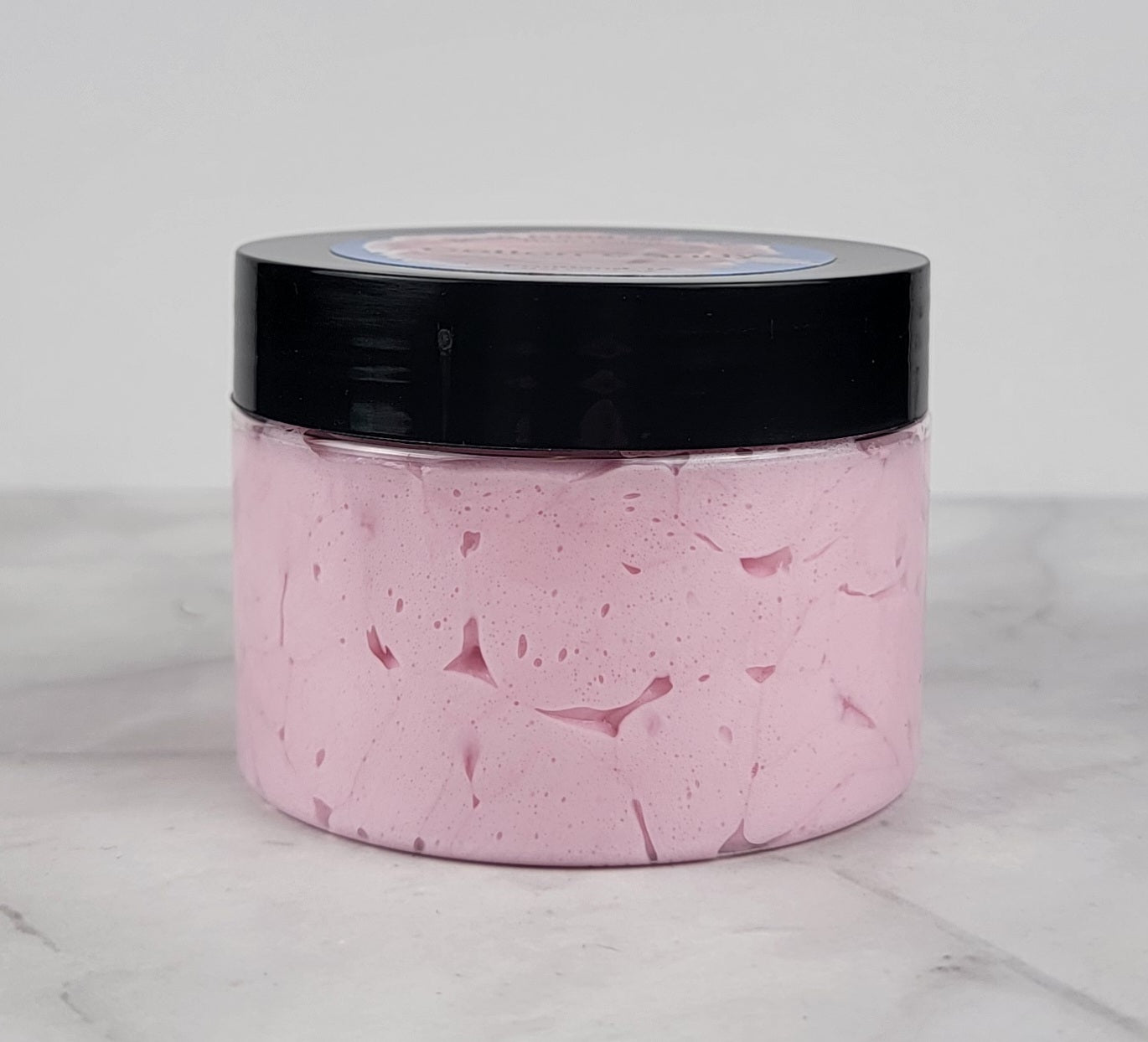 Lightweight, whipped moisturizer with a playful, fruity aroma