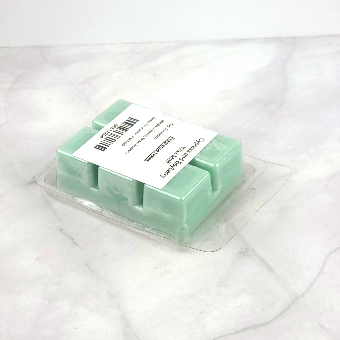 Eco-friendly Cypress and Bayberry Wax Melt with a refreshing blend of crisp cypress, rich bayberry, and warm incense, perfect for a nature-inspired ambiance.