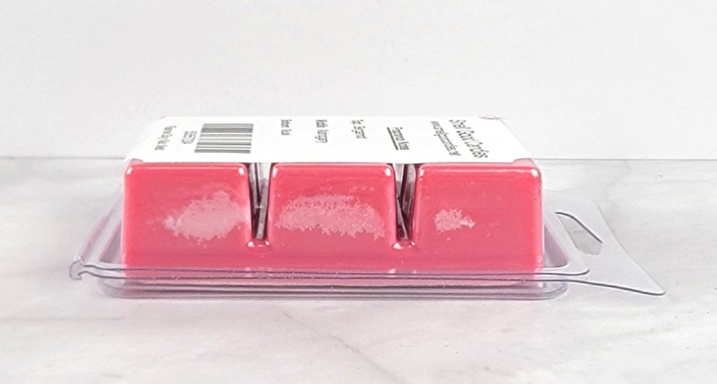 Handcrafted soy wax melt on wooden tray