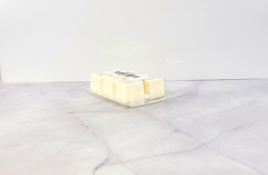 Masculine soy wax melt in dark, cozy setting