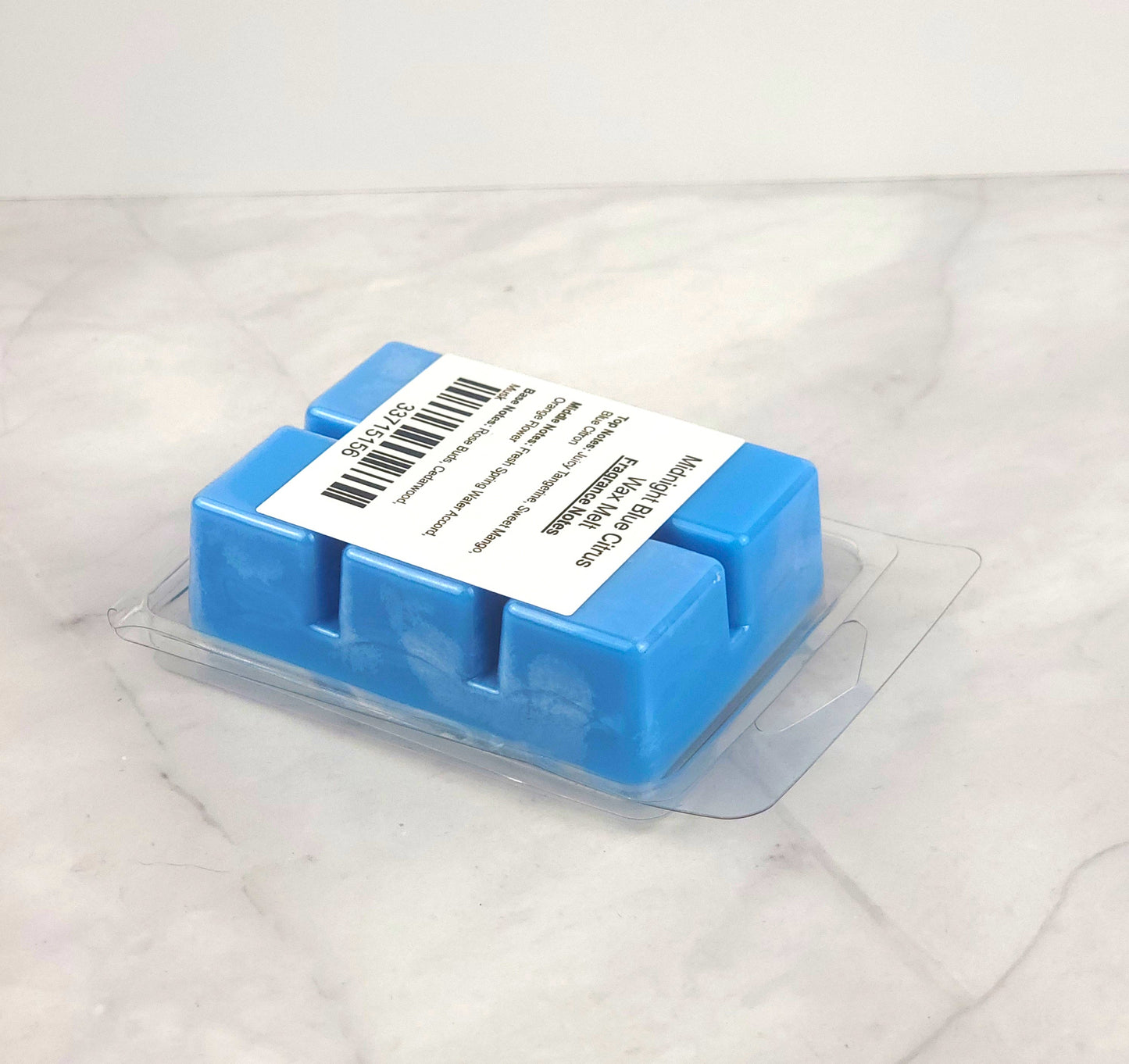 Bath & Body Works-inspired Midnight Blue Citrus Wax Melt with vibrant blue citron, orange flower, and musk for a clean, long-lasting burn.