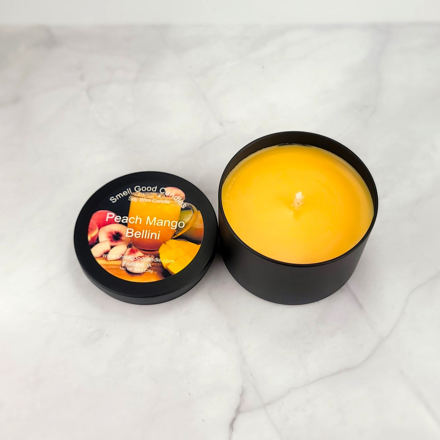 Hand-poured candle with juicy peach, mango, and warm sandalwood fragrance.