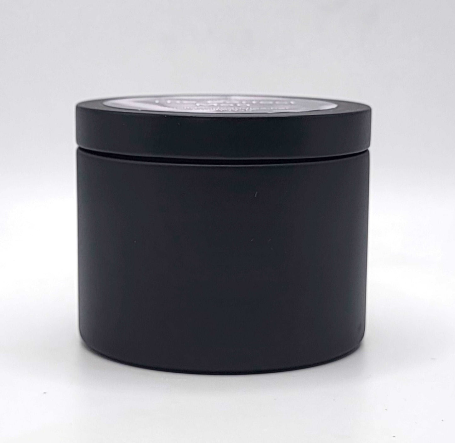 Hand-poured 100% soy wax candle with citrus, spice, and rich woody notes.