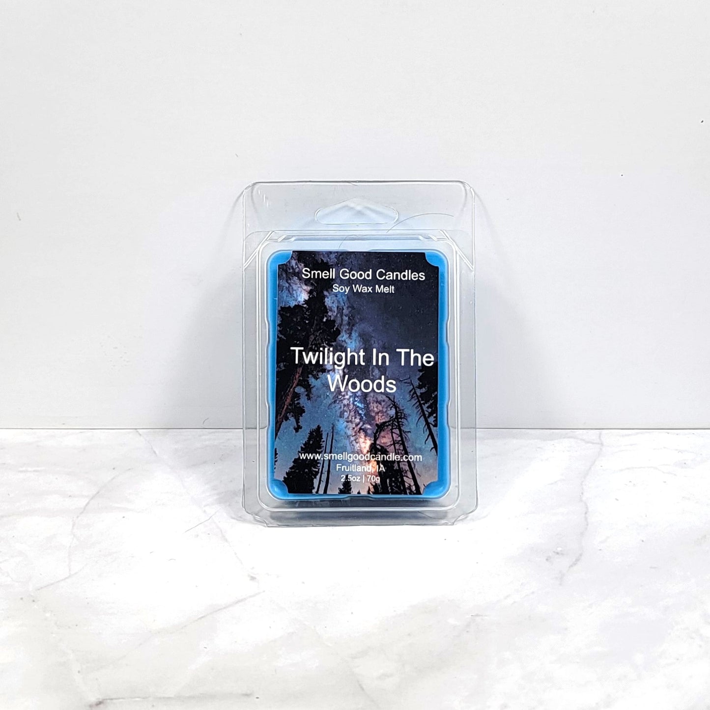 Twilight in the Woods soy wax melt with forest-inspired decor
