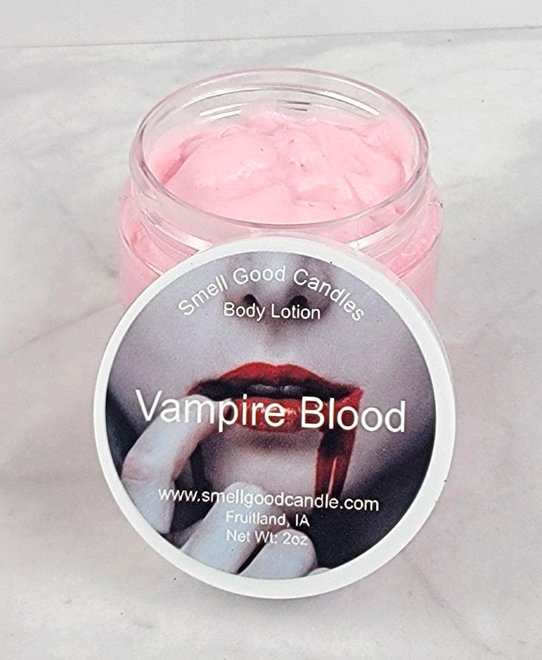 Seductive berry and musk-scented lotion in a sleek 2oz jar.