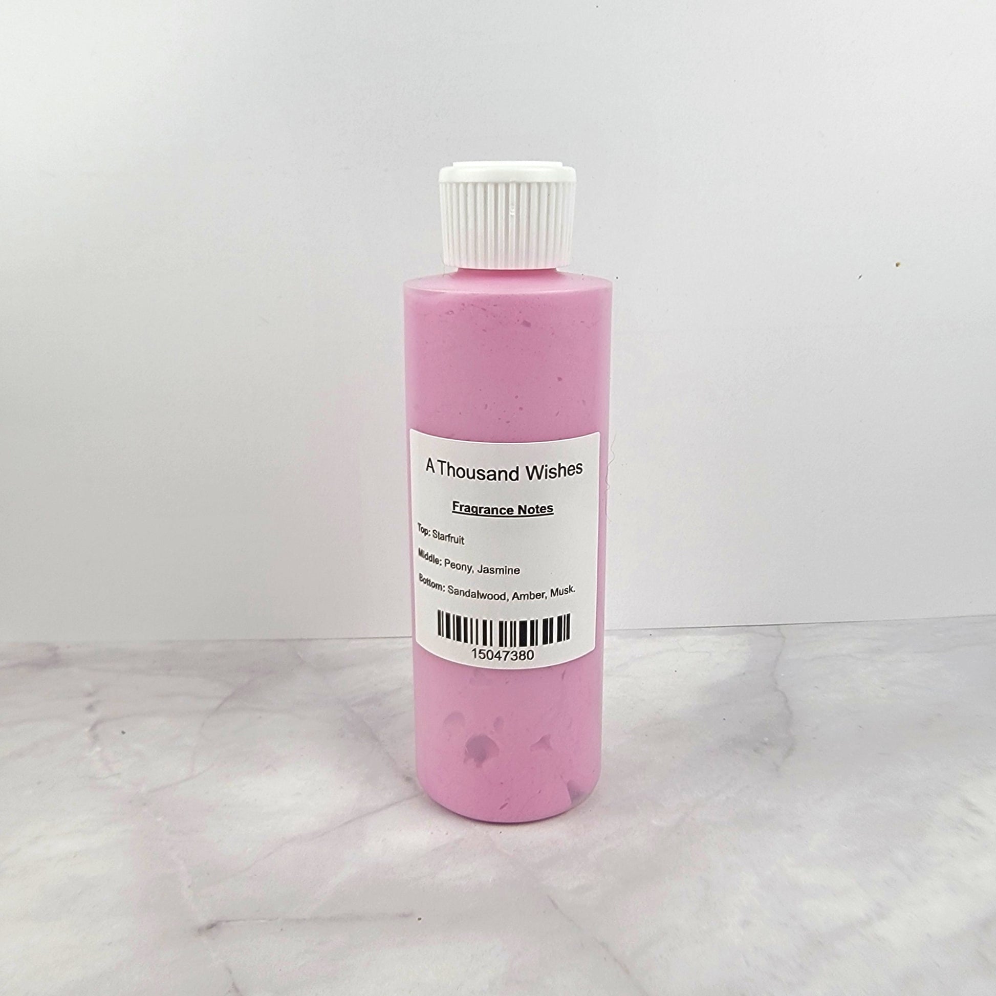A Thousand Wishes Whipped Body Lotion in a 6oz jar with elegant packaging