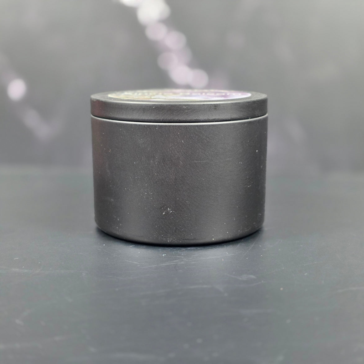 Alpine Balsam soy candle in matte black jar by Smell Good Candles -elegant hand-poured holiday scent.
