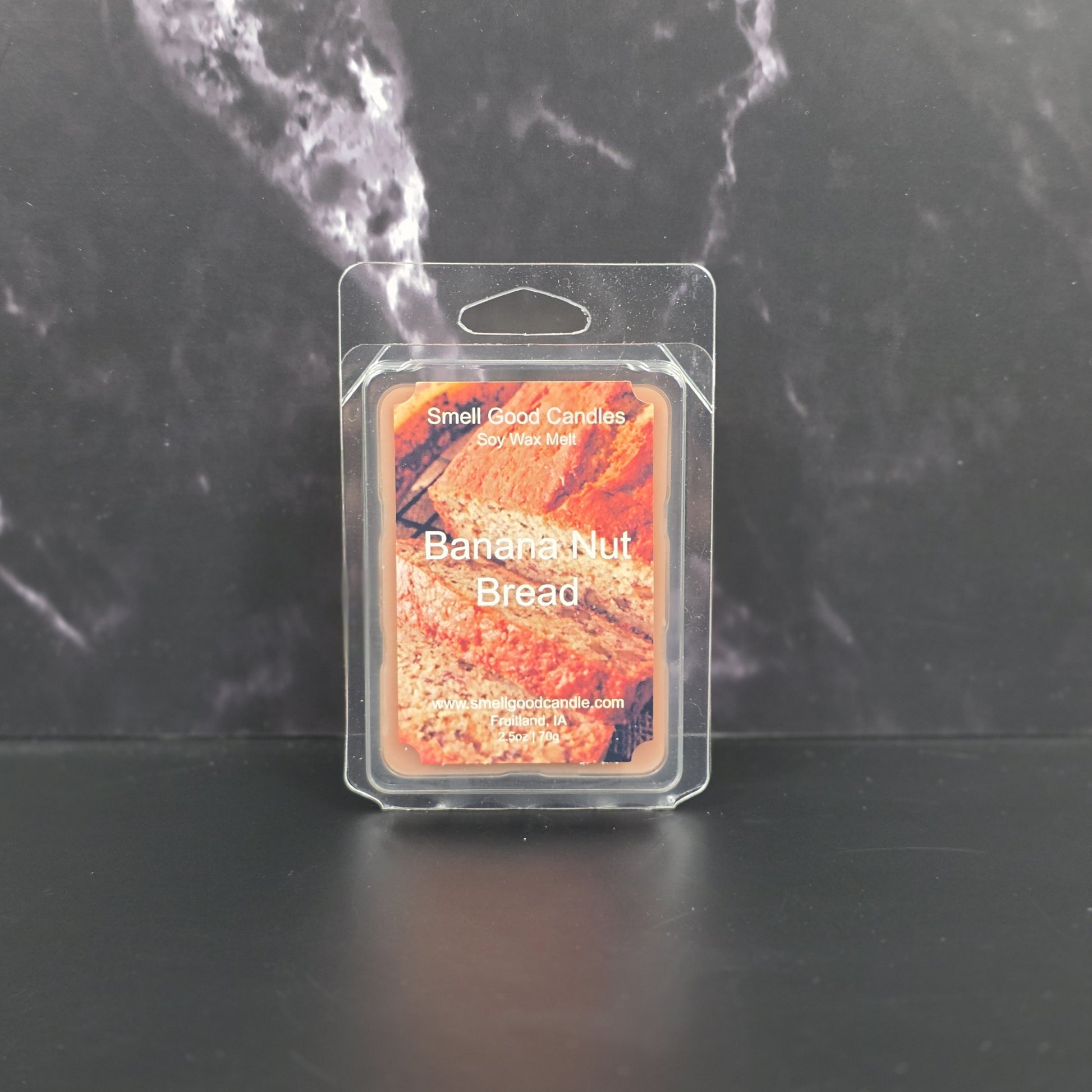 Wax melt packaging labeled 'Banana Nut Bread' by Small Good Candles on a dark background