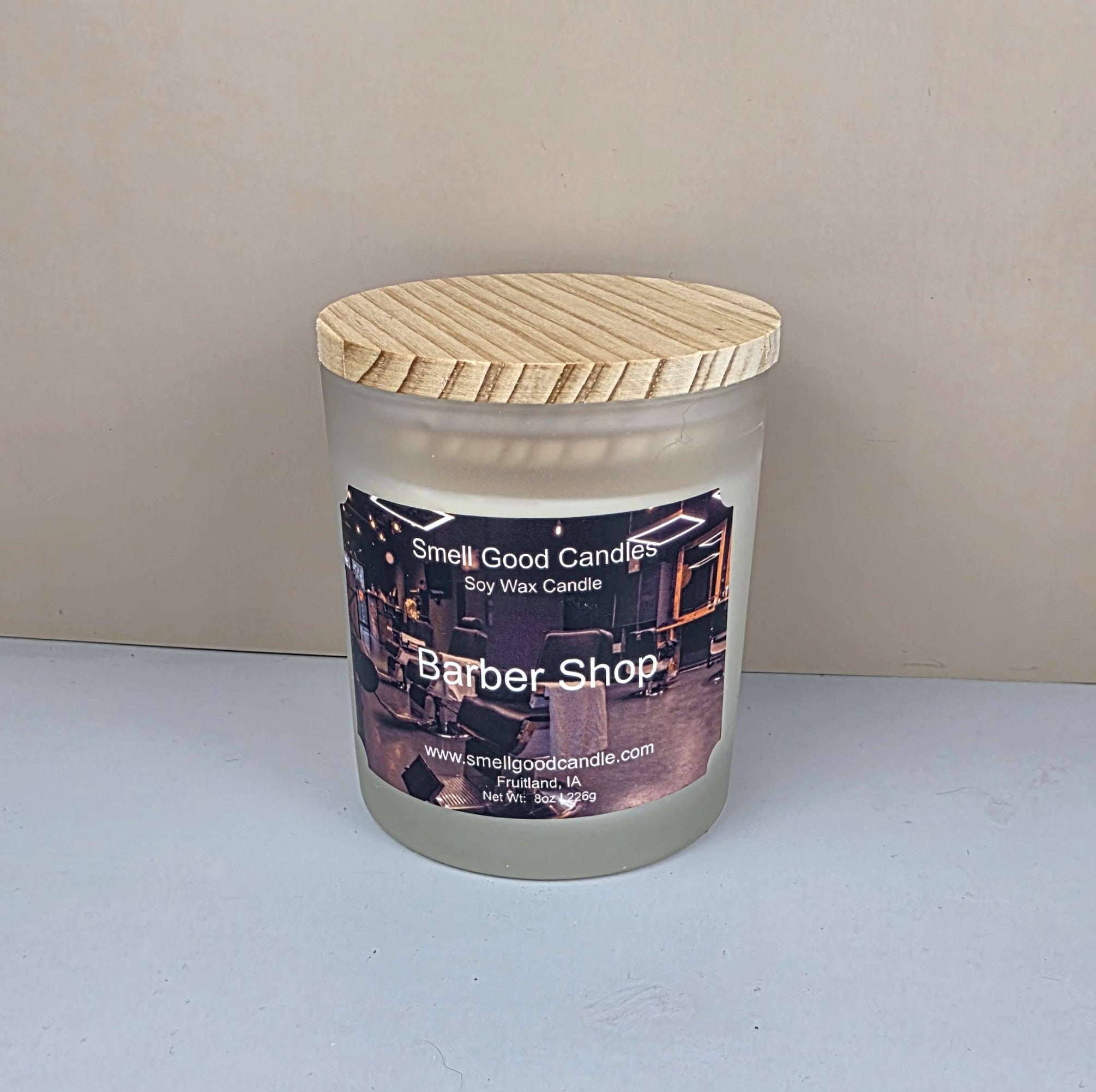 White frosted glass candle with wooden lid