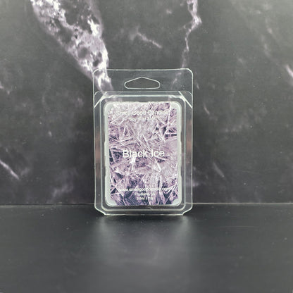 Packaged wax melt with 'Black Ice' design on a dark marble background