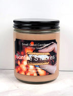Bonfire S’mores candle glowing in cozy fall setting