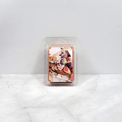Wax melt package labeled 'Brown Sugar & Fig' on a white surface with a light gray background