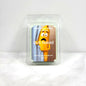 Candle packaging with cartoon character and 'Butt Naked' text on a white background