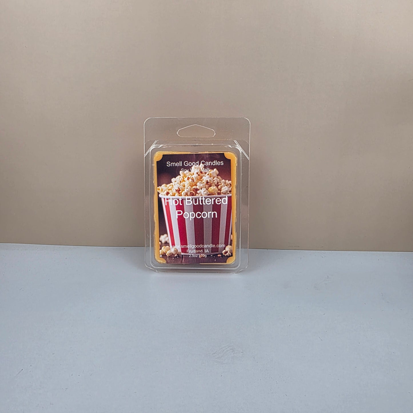 Packaged popcorn product on a neutral background