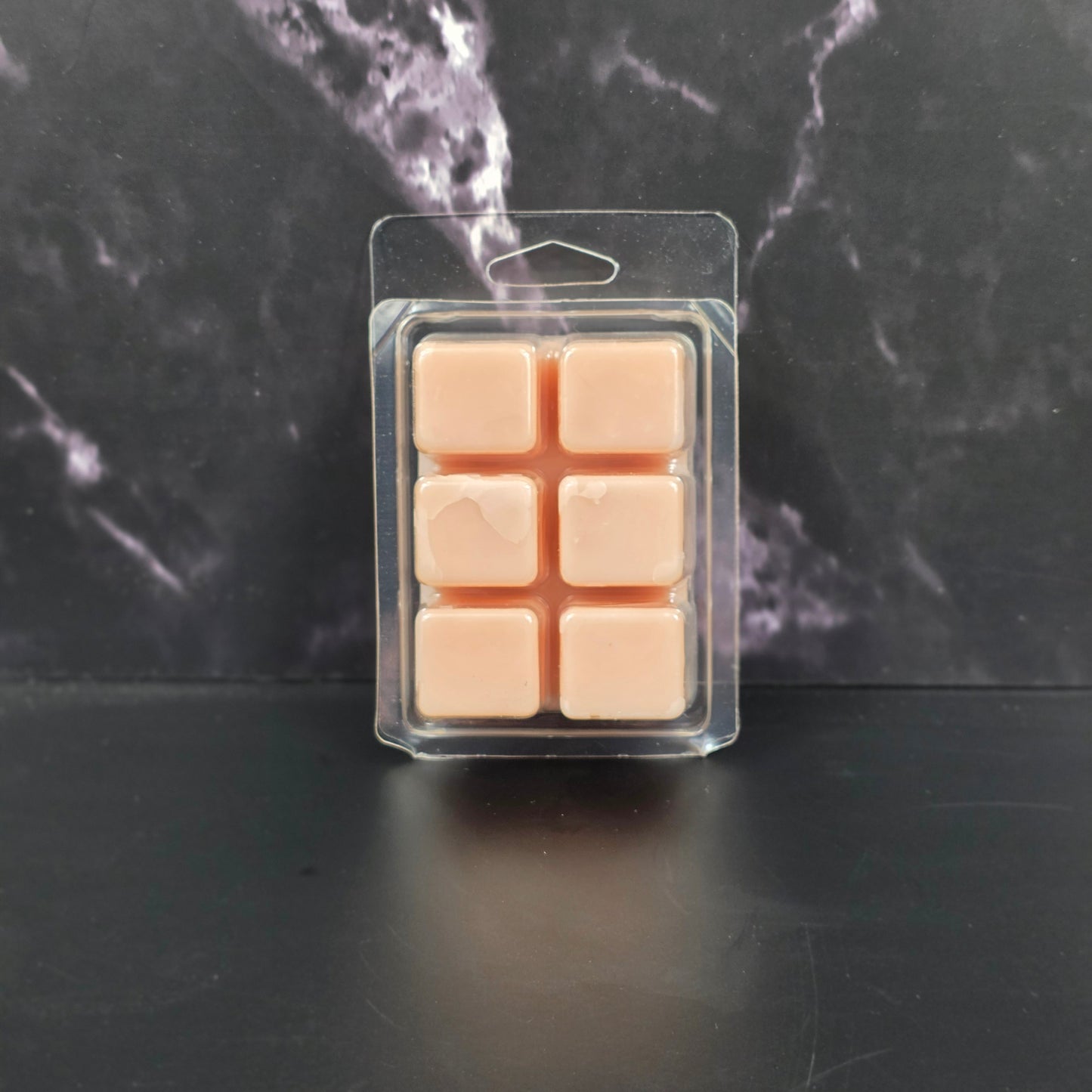 Cozy soy wax melt featuring caramel, popcorn, and sea salt fragrance