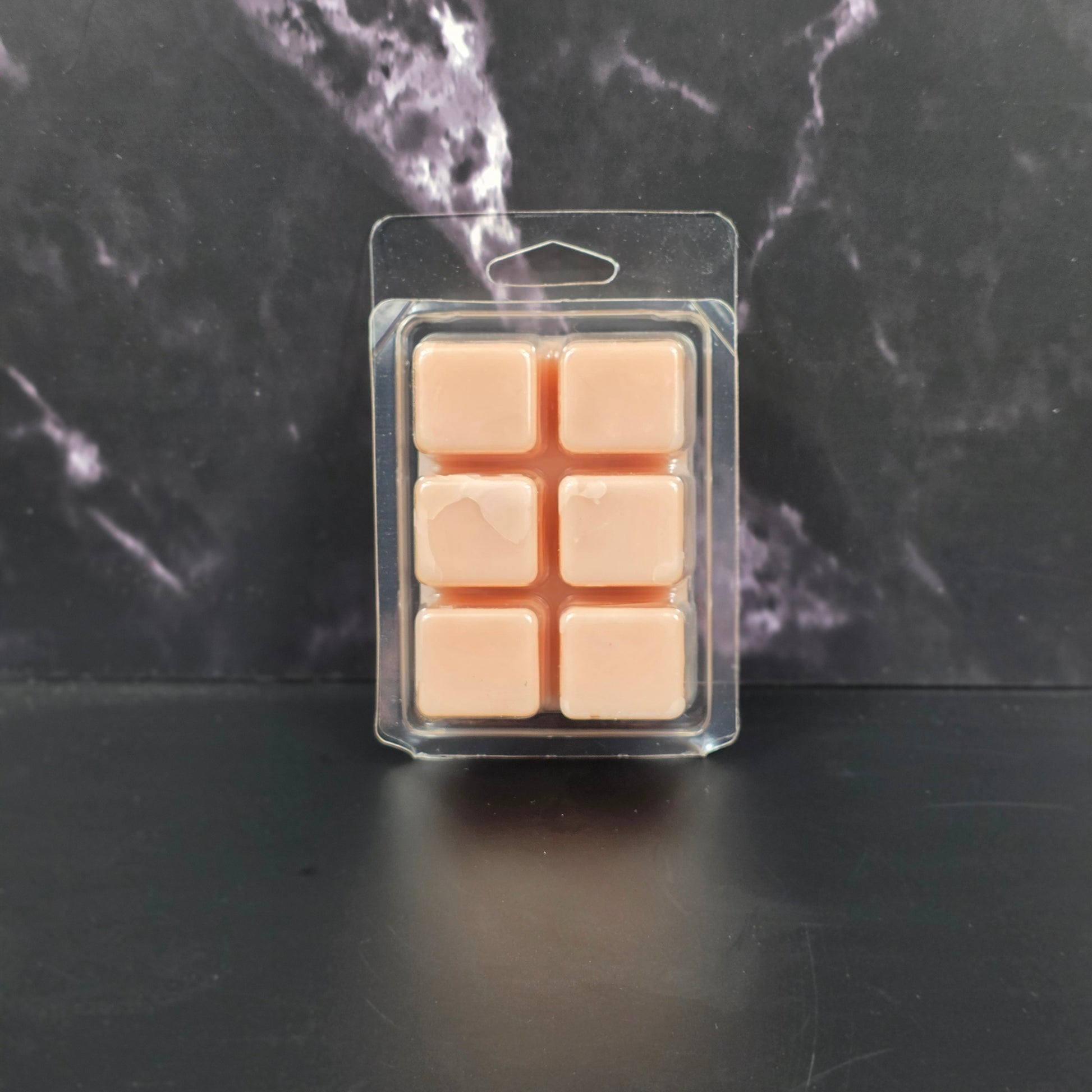 Cozy soy wax melt featuring caramel, popcorn, and sea salt fragrance