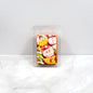 Christmas Cookie soy wax melt with festive red ribbon and holiday decor