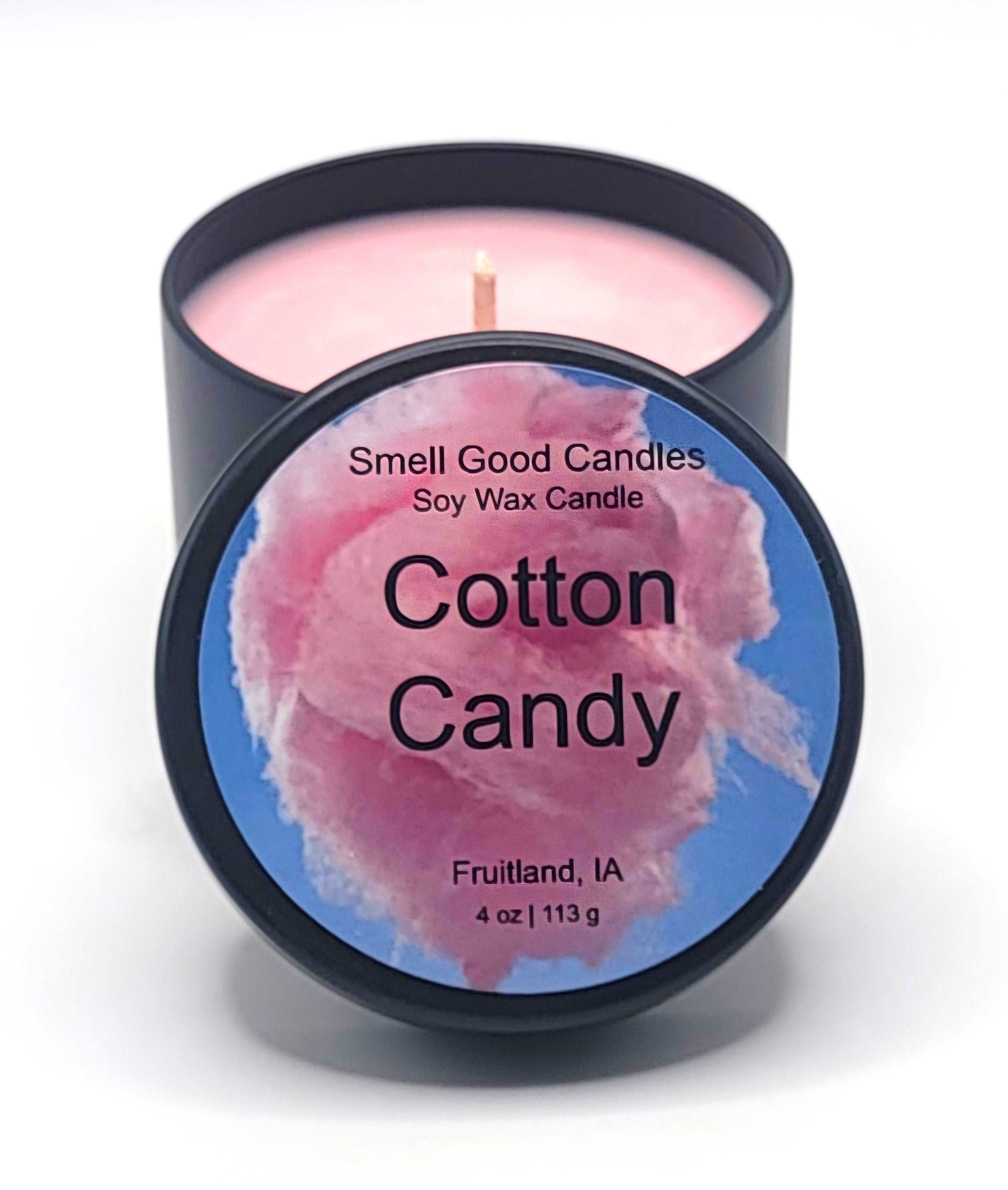 Handcrafted soy candle with strawberry, raspberry, and caramel fragrance