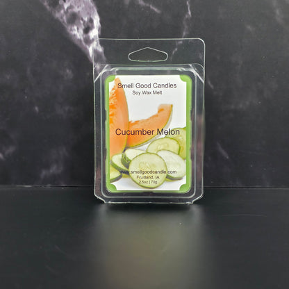 Cucumber Melon wax melt packaging on a dark marble surface