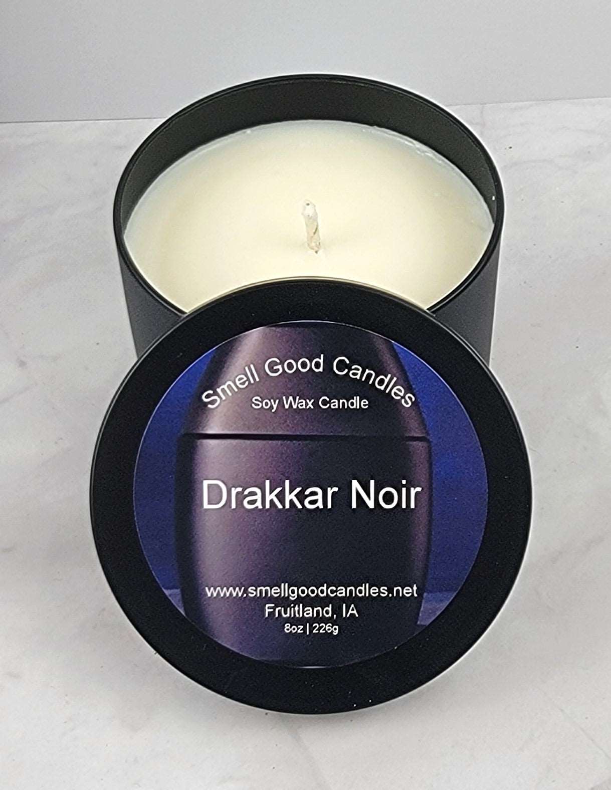 Drakkar Noir masculine scented soy candle with leather and amber notes
