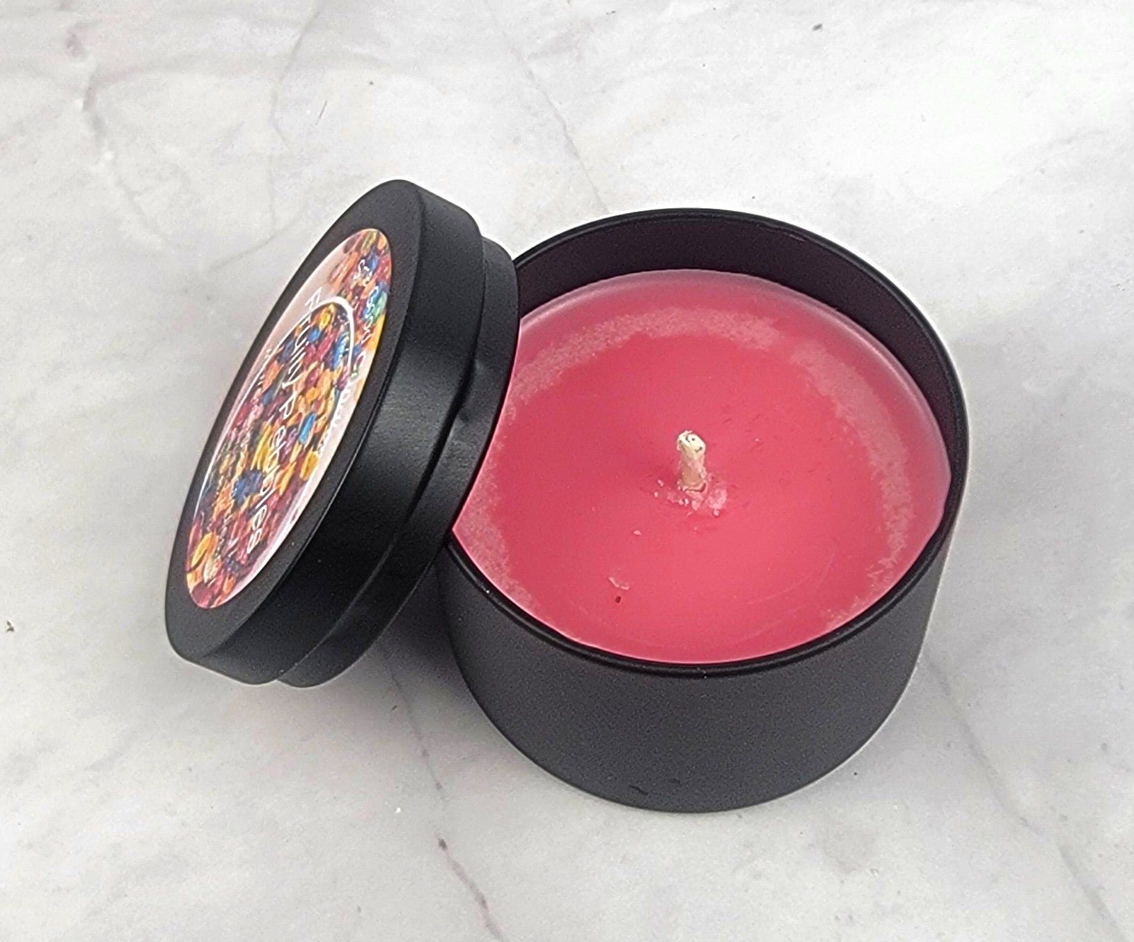 Hand-poured candle with a playful scent of citrus, lavender, vanilla, and sandalwood.