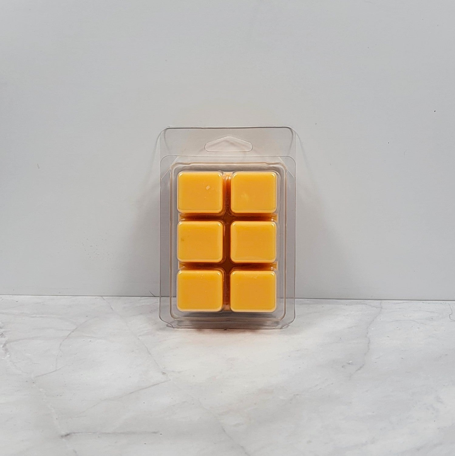 Hand-poured wax melt featuring citrus and gardenia