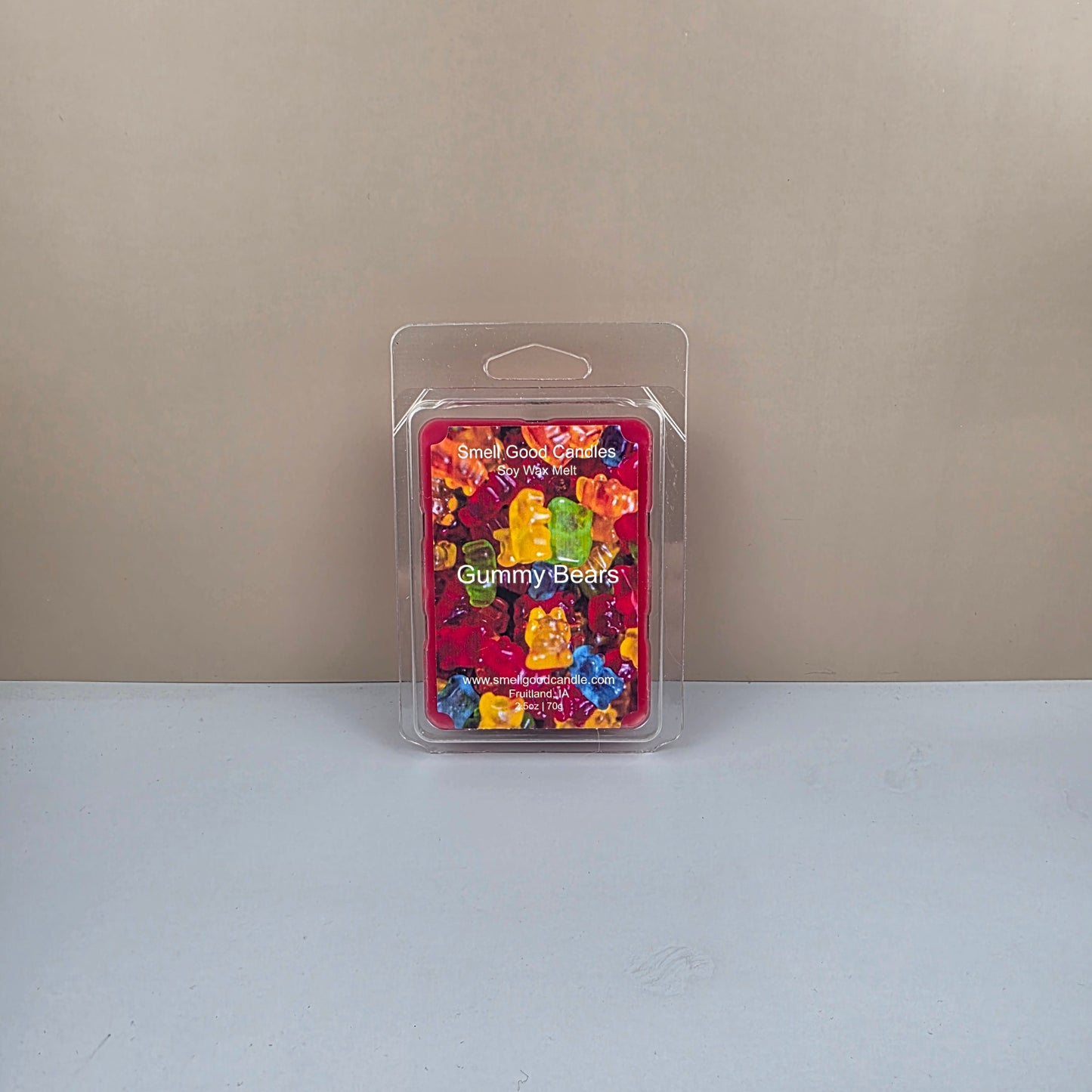 Packaged gummy bears on a neutral background