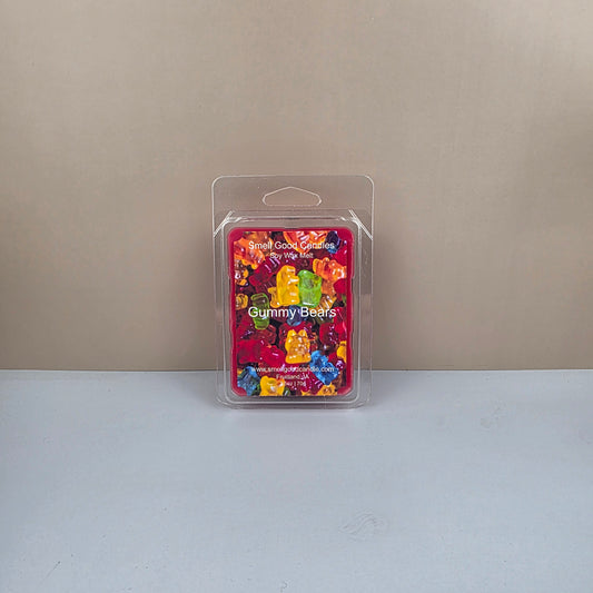 Packaged gummy bears on a neutral background