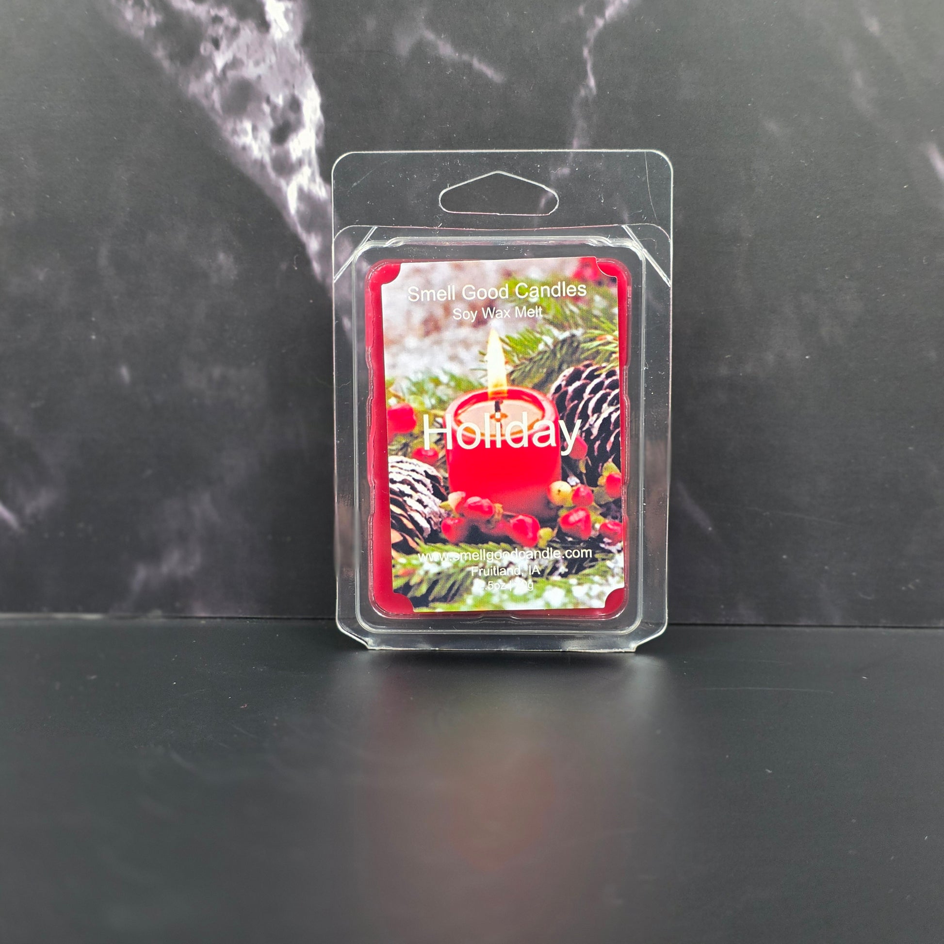 Wax melt package with 'Folke' branding on a dark surface