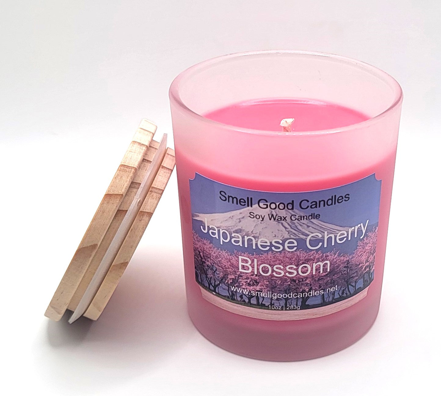 Elegant floral candle in frosted glass