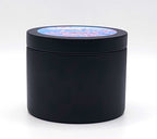 Elegant handcrafted candle with cherry blossom and sandalwood fragrance.