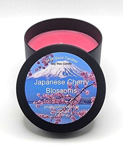Japanese Cherry Blossom candle with floral and wood elements.