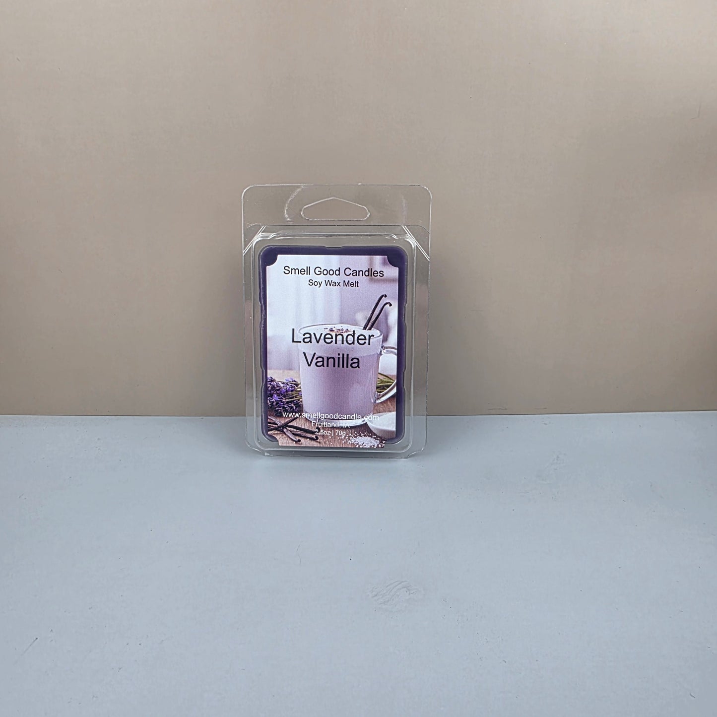 Packaged lavender vanilla wax melt on a neutral background