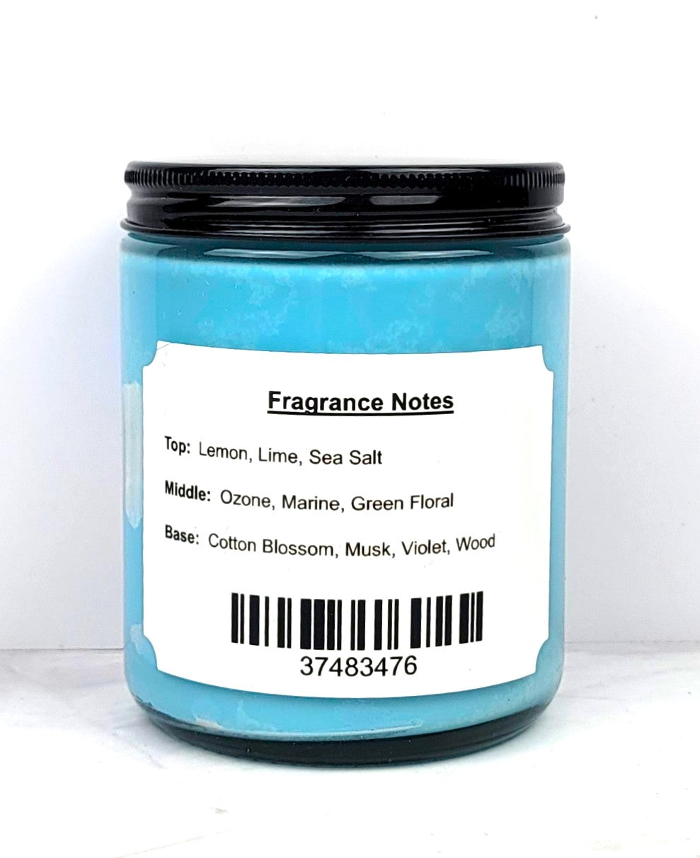 Hand-poured beach-inspired candle featuring lemon, marine, and soft floral notes.