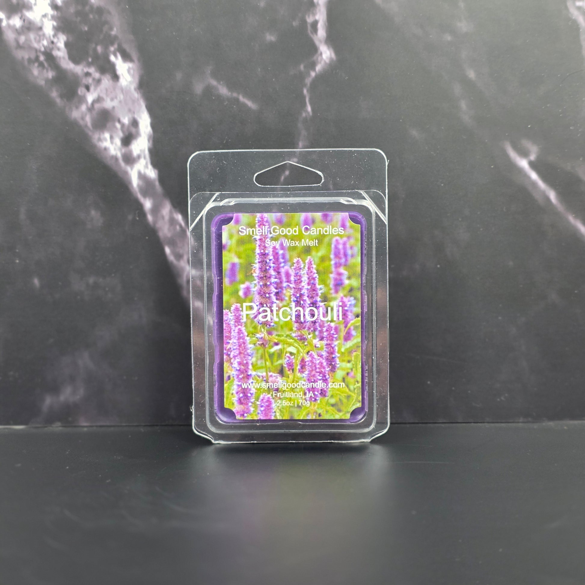 Packaged product with colorful label on a dark marble surface