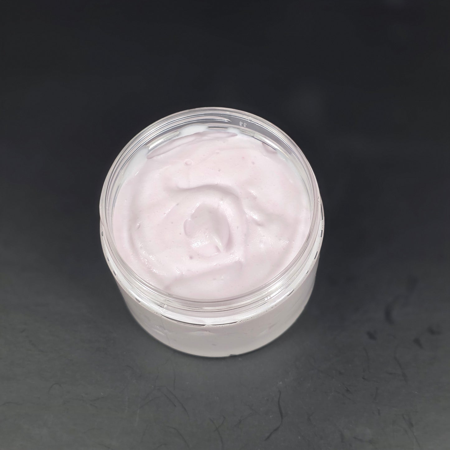 Whipped body lotion with lavender, pink sugar, and amber fragrance