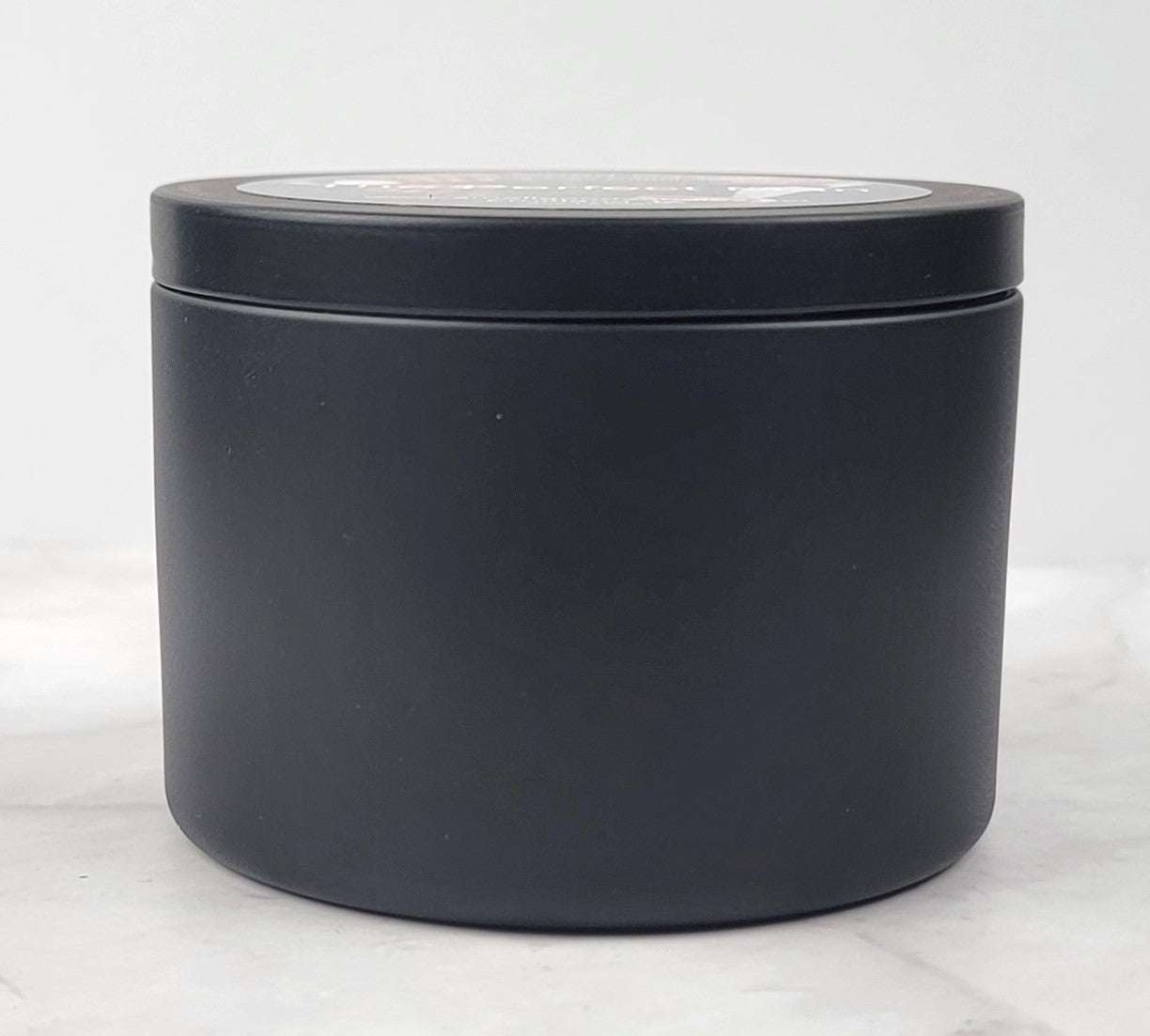 Clean-burning soy wax candle with a sophisticated, long-lasting masculine scent.