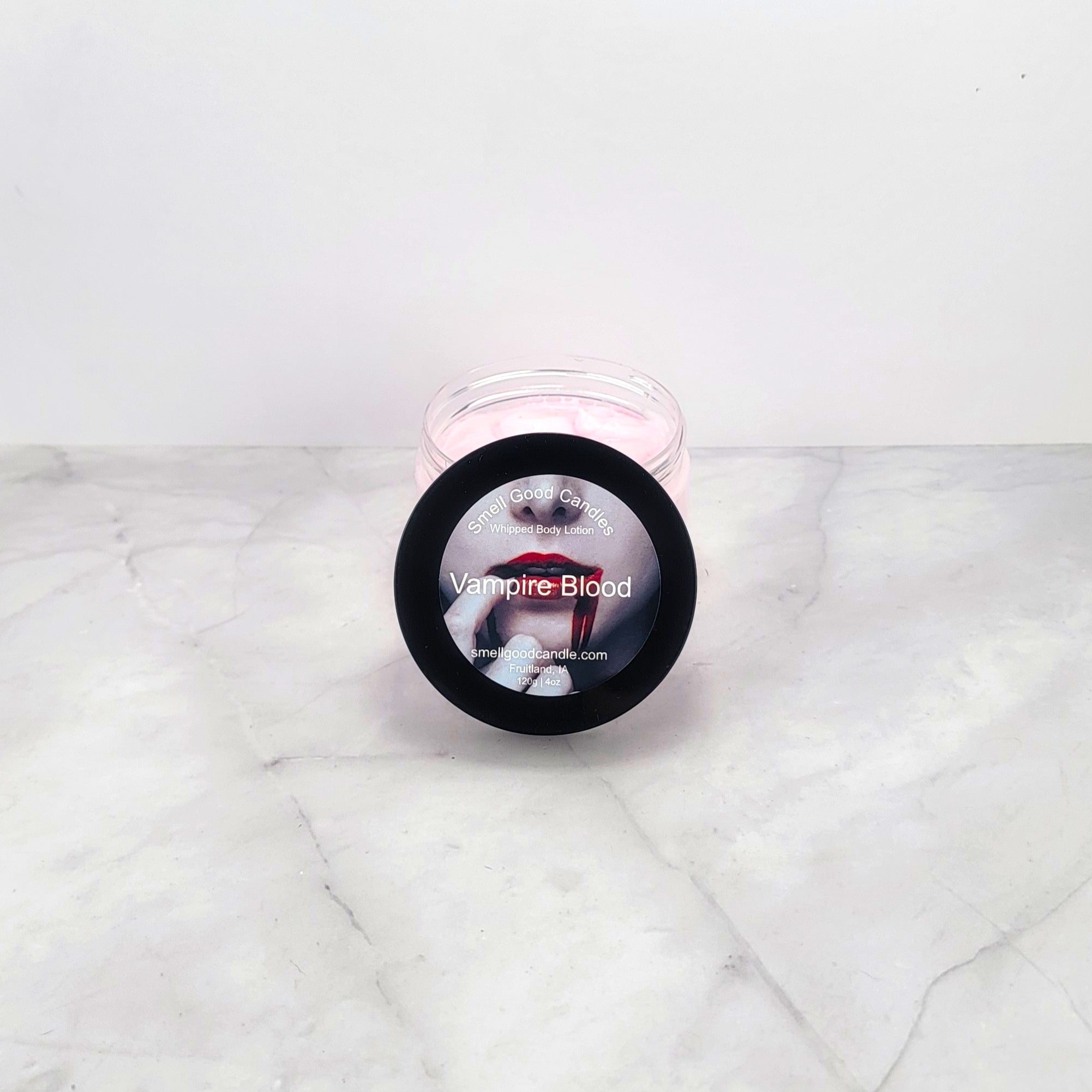 Vampire Blood Whipped Body Lotion with bergamot, sweet strawberry, and black musk.