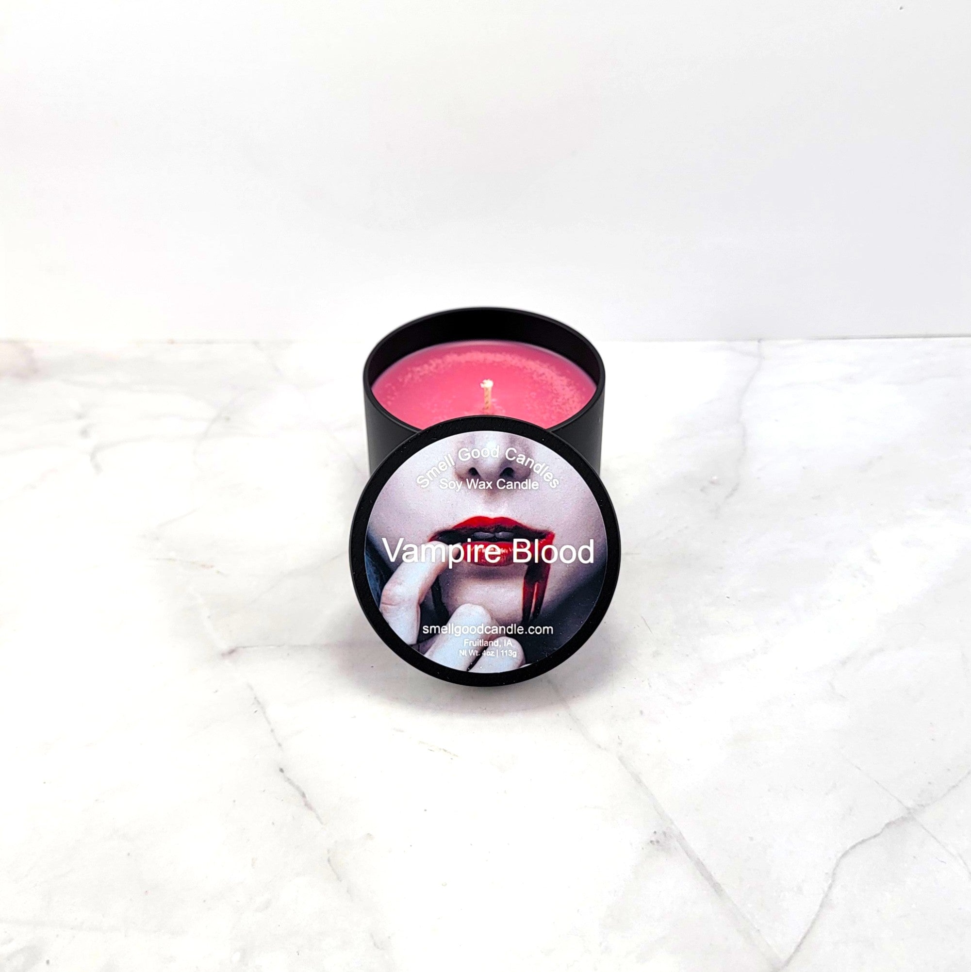 Hand-poured spooky candle with berry and musk notes