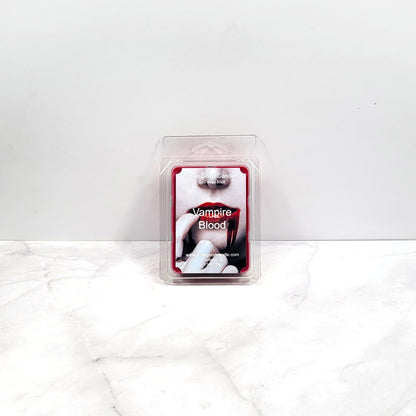 Vampire Blood soy wax melt with gothic decor and candlelight