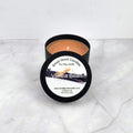 Luxury vanilla-scented candle for a cozy and inviting ambiance.