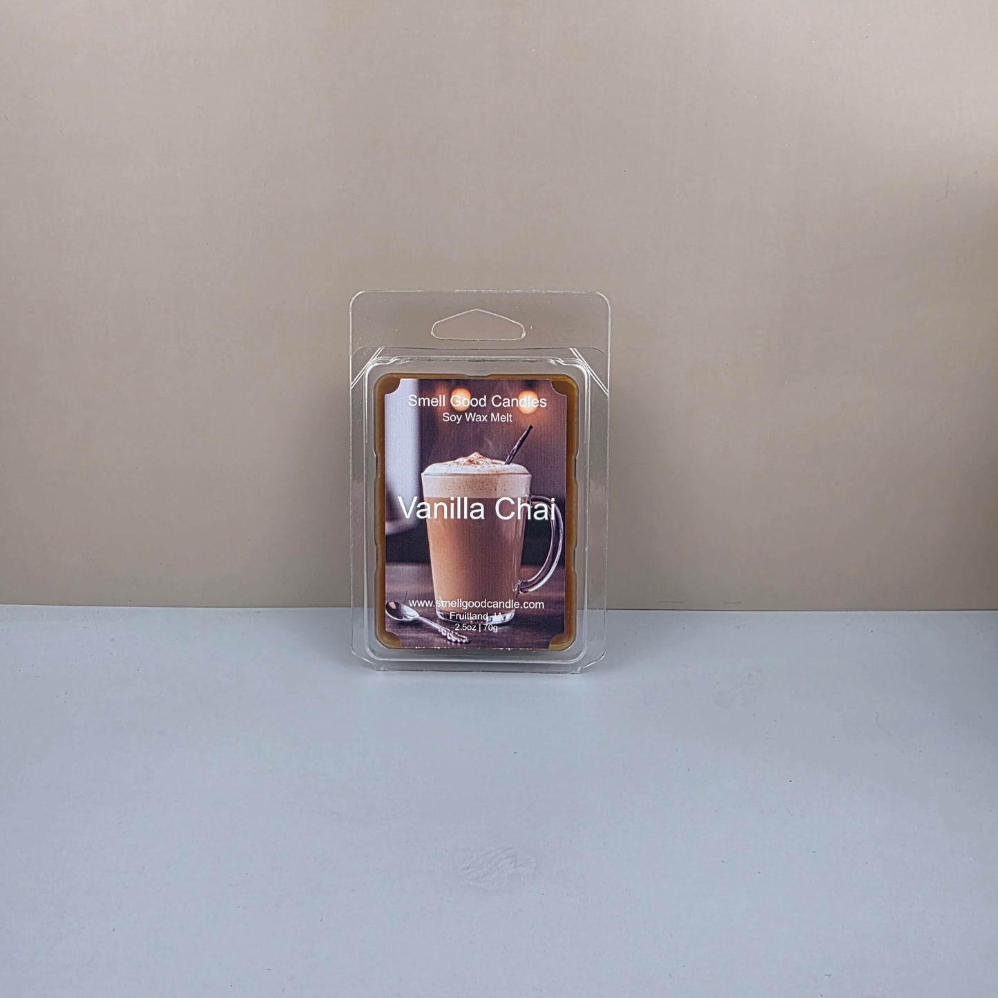 Packaged vanilla chai wax melt on a neutral background