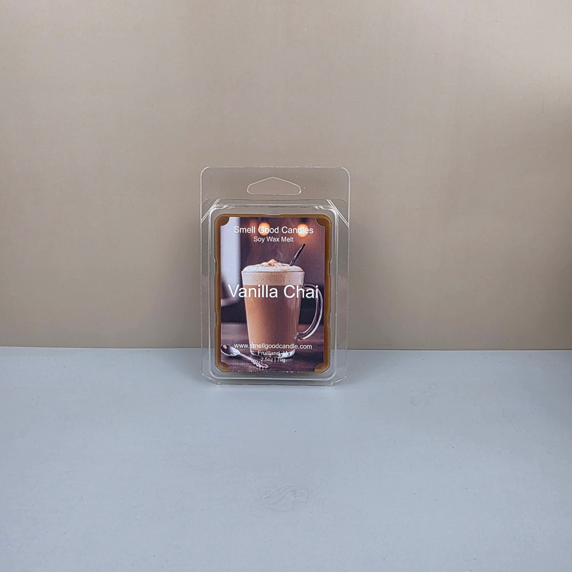 Packaged vanilla chai wax melt on a neutral background