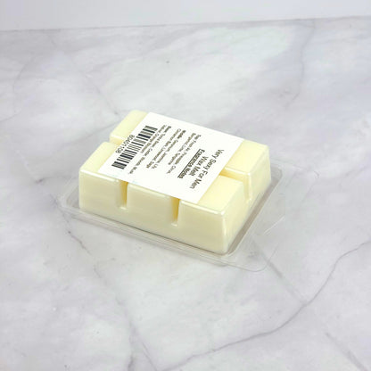 Eco-friendly soy wax melt with invigorating top notes of pineapple, lime, and bergamot, and a masculine base of musk, vetiver, and tonka bean, perfect for setting a sensual mood.